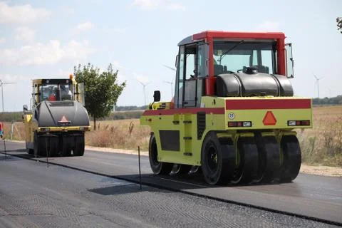 Group of heavy vibration roller compactors. Asphalting Stock-Fotos