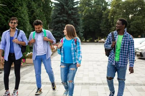 Group of high school students talking and laughing Stock Photos