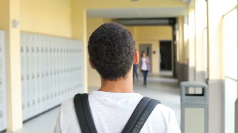 Group Of High School Students Walking Along Hallway Stock Footage 43310992