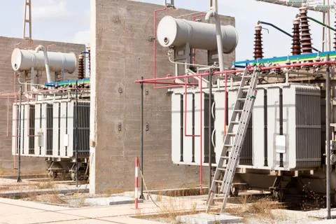 Group of high voltage transformers Stock Photos