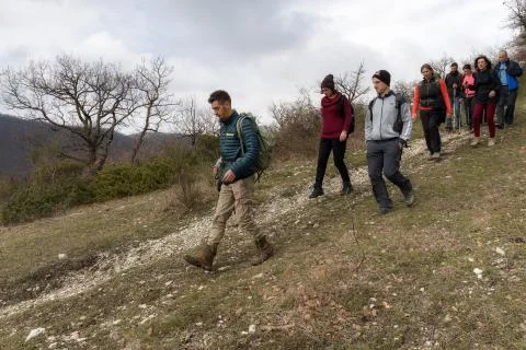 A group of hikers explore mountain paths Stock Photos