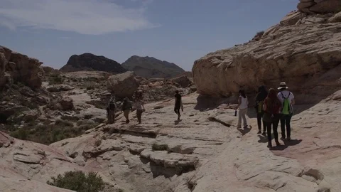 Group of hikers in Gold Butte National Monument Stock Footage