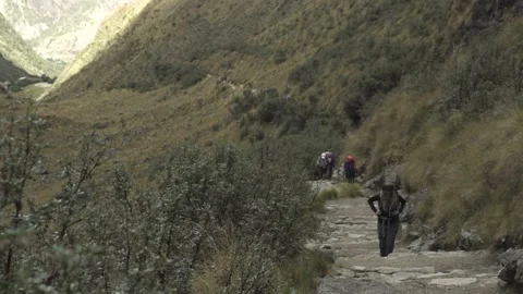 Group of hikers on Inca trail to Machu Picchu Cusco, Peru. Video stock 130353367