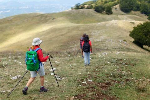 Group of hikers on the mountain path Stock Photos
