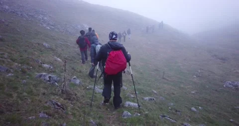Group of hikers walking on a mountain Video stock 132301759