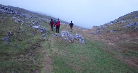Group of hikers walking on a mountain Video stock 132303824