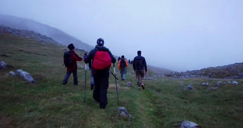 Group of hikers walking on a mountain Video stock 132303906