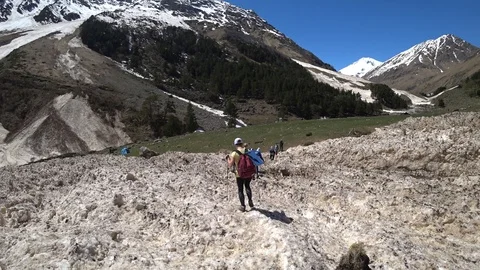 A group of hikers walking on the snow Video stock 90492501