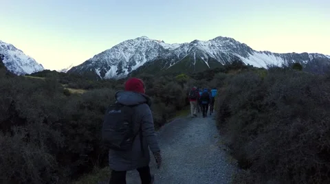 Group Hiking At Hooker Valley Track In Afternoon Stock-Footage 55757452