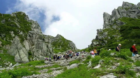 Group of hiking into the mountains. Stock Footage 27427101