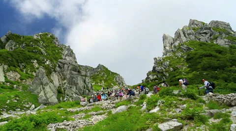 Group of hiking into the mountains. Stock Footage 27429118