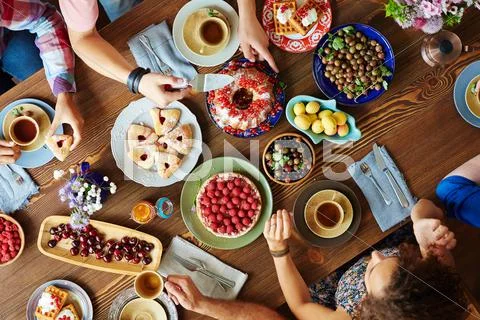 Group of humans having Thanksgiving dinner Stock Photos