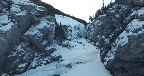 Group Ice Climbing Waterfall in Alberta Stock Footage 90729409