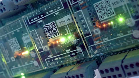 A group of identical printed circuit boards with red LEDs on and green flashing Stock Footage 218020422