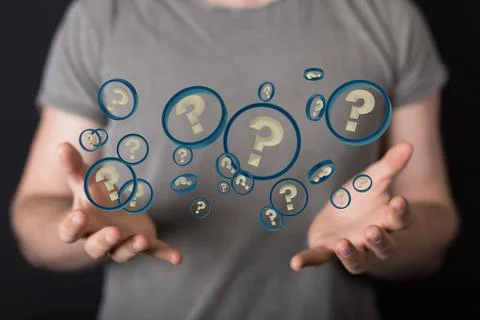 Group of illustrative question marks floating over a man's hands Stock Photos