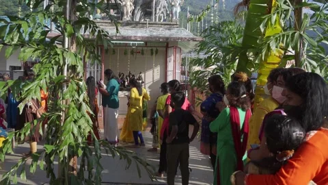 A group of Indian devotees queue to get the charity food Stock Footage 200002538