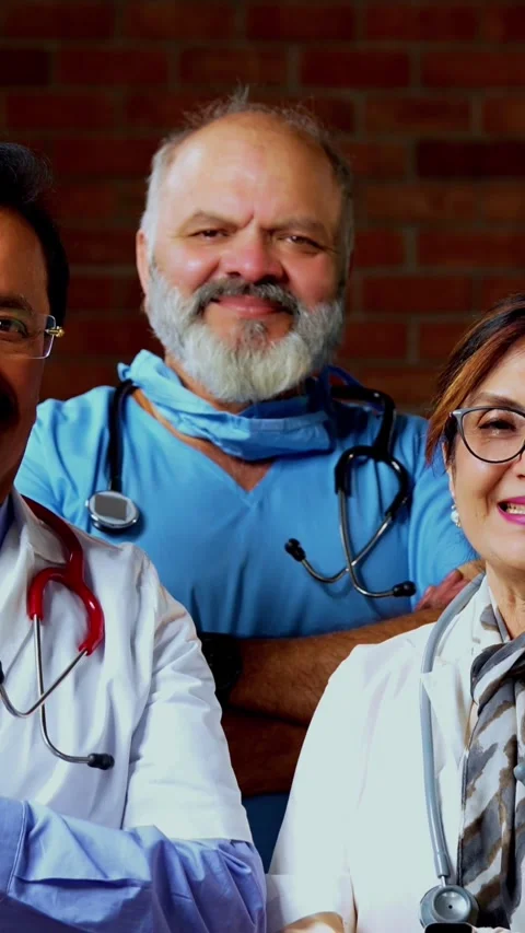 Group of indian doctors and surgeons discussing case in hispital while standing Stock Footage 342803824