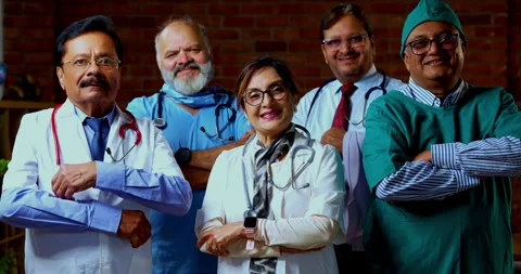 Group of indian doctors and surgeons discussing case in hispital while standing Stock-Footage 342806472