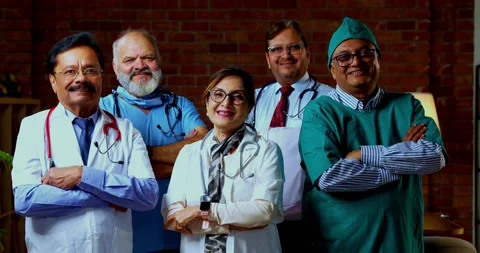 Group of indian doctors and surgeons discussing case in hispital while standing Stock Footage 342806836