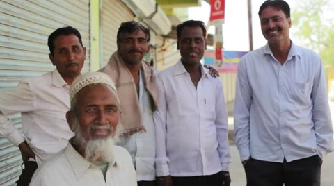 Group of Indian men smiling for camera, medium shot Stock Footage 50731130
