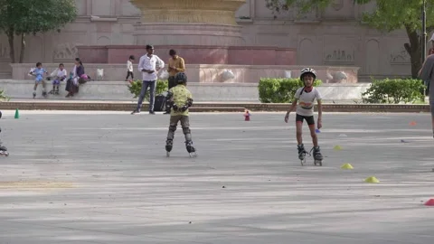 Group of Indian Young Kids practicing Roller skates on a training track. Stock Footage 248758873