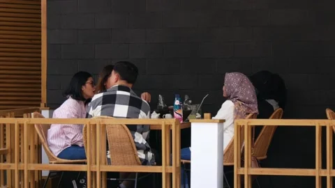 Group of indonesian worker having lunch in the restaurant Stock Footage 238080971