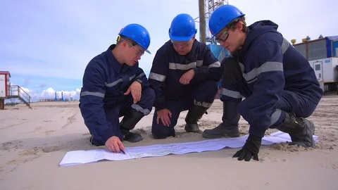 Group of industrial workers in a refinery Stock Footage 113790766