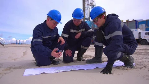 Group of industrial workers in a refinery Stock Footage 113790842