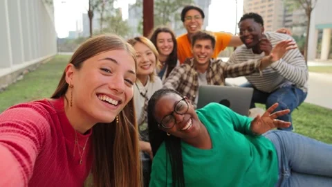 Group of international friends having fun, gesturing and looking at camera Stock Footage 280415460