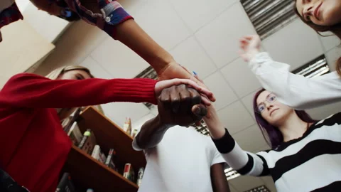 Group of international students supporting each other on stood around in library Stock Footage 242019453