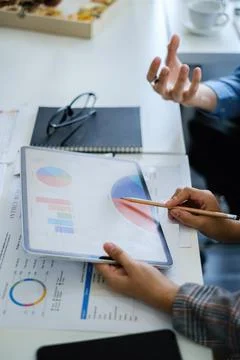 Group of IT consultant working by digital tablet and management big data and Stock Photos
