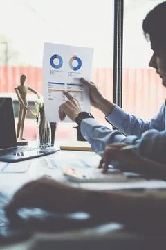 Group of IT consultant working together and management big data and analyze Stock Photos