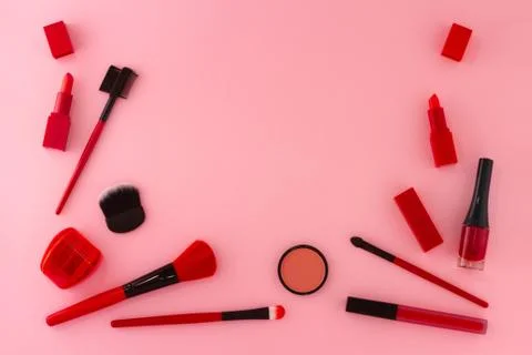 Group of items for make-up in red shades. Stock Photos
