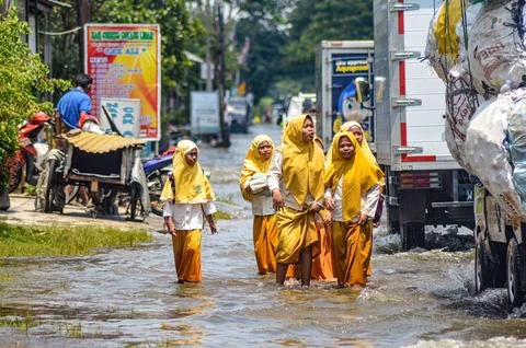 A group of junior high school students returning home from school crossed f.. Stock Photos