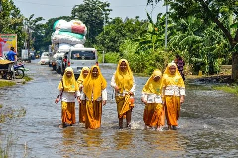A group of junior high school students returning home from school crossed f.. Stock Photos