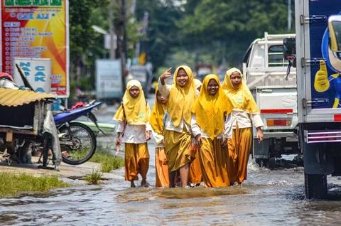 A group of junior high school students returning home from school crossed f.. Stock Photos