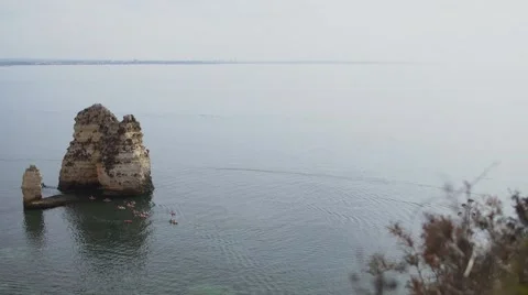 Group kayaking in the ocean Stock Footage 55889132