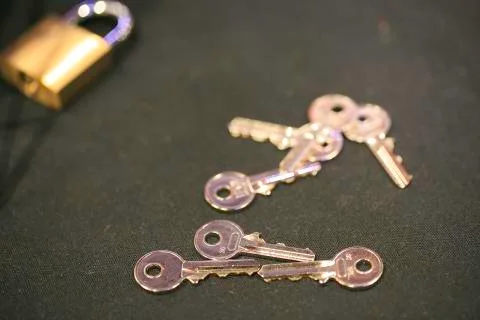 Group of keys and a padlock Stock Photos