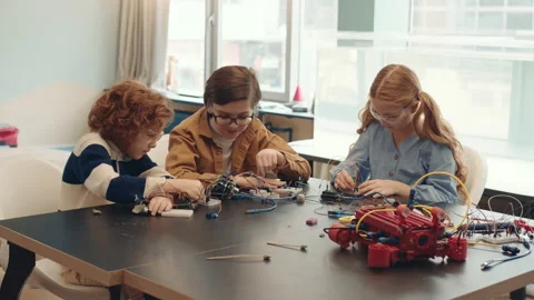 Group of Kids Constructing Robots Video stock 153464209