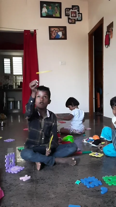 Group of kids play using english alphabet and numbers rubber mat inside the hous Stock Footage 150852900