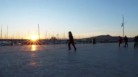 Group of kids playing during sunset  Stock Footage 84154767