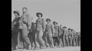 Group Of Korean P.o.w. Soldiers Sing While Marching - 1951 Stock Footage