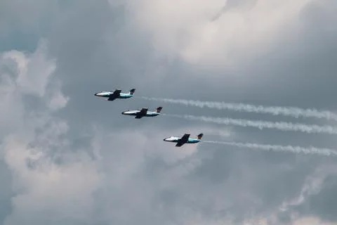 Group of L-29 jet planes with dramatic cloudscape Stock Photos