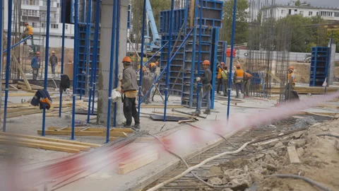 Group of laborers working at overpass bridge construction project Stock Footage 290506370
