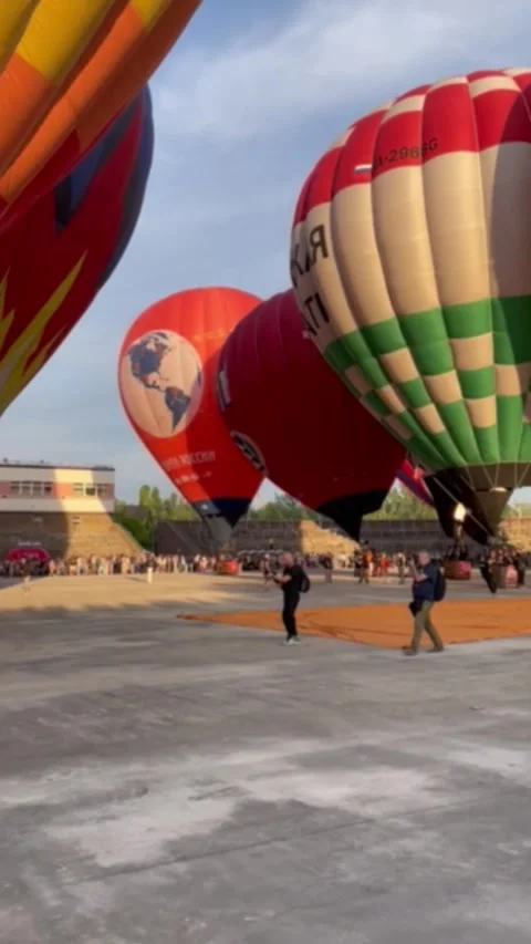 A group of large balloons at the start Stock Footage 248293425