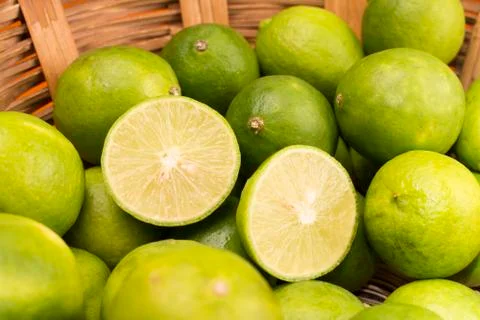 Group of Lemons in a Basket. Stock Photos