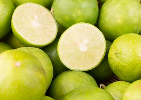 Group of Lemons in a Basket. Stock Photos