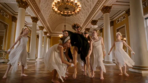 Group Lifts Dancer In Dramatic Artistic Expression Stock Footage 306790000