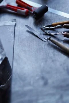Group of linocut devices on table with copy space Stock Photos