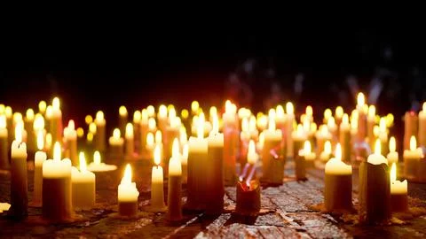 Group of Lit Candles on Table Illustration